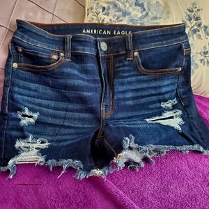 Distressed denim shorts